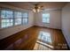 Living room with hardwood floors and large windows at 940 Valley Dr, Newton, NC 28658