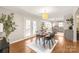 Dining area with hardwood floors and French doors leading to the backyard at 941 Squirrel Hill Rd, Charlotte, NC 28213