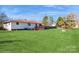 Spacious backyard featuring a deck and lush green lawn at 9938 Sandra Ln, Fort Mill, SC 29707