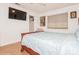 Main bedroom with a wooden sleigh bed and light blue bedding at 9938 Sandra Ln, Fort Mill, SC 29707