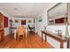 Dining room featuring a chandelier, hardwood floors, and a table set for six at 9938 Sandra Ln, Fort Mill, SC 29707