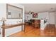 Living room with hardwood floors, comfy seating, and built-in shelving at 9938 Sandra Ln, Fort Mill, SC 29707