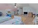 Charming bedroom with twin beds, a vanity, and plenty of natural light at 102 Serene St, Mount Gilead, NC 27306