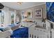 Charming Bedroom features a crib, dresser, and plenty of natural light at 102 Serene St, Mount Gilead, NC 27306