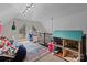 Bright bonus room with plenty of natural light, a playhouse, and a desk at 102 Serene St, Mount Gilead, NC 27306
