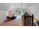 Bonus room with ample space, a built-in playhouse, and a desk area at 102 Serene St, Mount Gilead, NC 27306