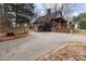 Asphalt driveway with stone border at 102 Serene St, Mount Gilead, NC 27306