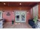 Inviting front door entrance with double doors and a cozy doormat at 102 Serene St, Mount Gilead, NC 27306
