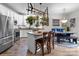 Modern kitchen with stainless steel appliances and an island with seating at 102 Serene St, Mount Gilead, NC 27306