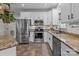 Modern kitchen with stainless steel appliances and granite countertops at 102 Serene St, Mount Gilead, NC 27306