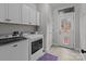 Laundry room with washer, dryer, and exterior access at 102 Serene St, Mount Gilead, NC 27306