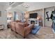 Spacious living room boasts a fireplace, built-in shelving, and large TV at 102 Serene St, Mount Gilead, NC 27306