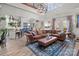 Open living room with a comfortable sectional sofa and access to the kitchen at 102 Serene St, Mount Gilead, NC 27306