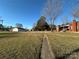 Two brick houses and a detached garage on a large lot at 114 Barker Rd, Dallas, NC 28034