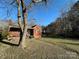 Brick ranch house with front porch at 114 Barker Rd, Dallas, NC 28034