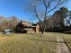 Brick ranch house with front porch and yard at 114 Barker Rd, Dallas, NC 28034