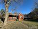 Brick ranch house with front porch and yard at 114 Barker Rd, Dallas, NC 28034