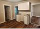 Additional kitchen view with white cabinets and granite countertops at 1302 Brookdale St, Kannapolis, NC 28083