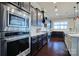 Well-equipped kitchen with stainless steel appliances and white quartz countertops at 13204 Feale Ct, Charlotte, NC 28278