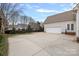 Attached garage with additional parking space at 14214 Sullivan Watch Dr, Huntersville, NC 28078