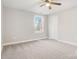 Well-lit bedroom featuring a ceiling fan and window at 1455 Southwest Blvd, Newton, NC 28658