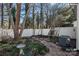 Private backyard with stone patio and trees at 147 Kallie Loop, Mooresville, NC 28117