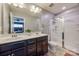 Bathroom with double vanity and walk-in shower at 17114 Belmont Stakes Ln, Charlotte, NC 28278