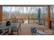 Deck overlooking backyard with wooded area and glimpses of pool at 2010 Belle Grove Dr, Marvin, NC 28173