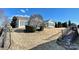 House with a sloped backyard and a black metal fence at 2087 Yellowstone Dr, Fort Mill, SC 29707
