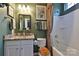 Bathroom with granite vanity, updated fixtures, and a shower/tub combo at 2087 Yellowstone Dr, Fort Mill, SC 29707