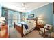 Spacious bedroom with wooden bed frame and plenty of natural light at 2087 Yellowstone Dr, Fort Mill, SC 29707