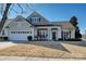 Craftsman style home with a two-car garage and manicured lawn at 2087 Yellowstone Dr, Fort Mill, SC 29707