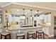 Modern kitchen with granite countertops, white cabinets, and a large island at 2087 Yellowstone Dr, Fort Mill, SC 29707