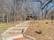 Brick steps leading to gazebo and wooded area at 2300 Hamilton Mill Rd, Charlotte, NC 28270