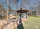 Relaxing gazebo with rocking chairs and a swing at 2300 Hamilton Mill Rd, Charlotte, NC 28270