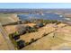 Aerial view showing home, outbuildings, and solar farm at 2808 Water Plant Rd, Maiden, NC 28650