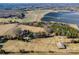 Aerial view showing home, outbuildings, and solar farm at 2808 Water Plant Rd, Maiden, NC 28650