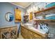 Bathroom with wood vanity and floating shelves at 2808 Water Plant Rd, Maiden, NC 28650