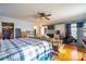 Main bedroom with built-in shelving and hardwood floors at 2808 Water Plant Rd, Maiden, NC 28650