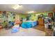 Multi-purpose room with a bed, seating, and storage at 2808 Water Plant Rd, Maiden, NC 28650