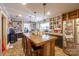 Rustic kitchen with an island and extensive shelving at 2808 Water Plant Rd, Maiden, NC 28650