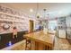 Island kitchen with butcher block countertop and floral wallpaper at 2808 Water Plant Rd, Maiden, NC 28650
