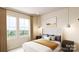 Comfortable bedroom with lots of natural light and neutral color scheme at 309 Old Town Village Rd, Waxhaw, NC 28173