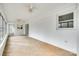 Sunroom with brick walls, tile floor, and multiple windows at 3608 Southwood Dr, Gastonia, NC 28056