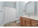 Well-appointed bathroom with wood vanity and shower at 3976 Stadler Ne Dr, Conover, NC 28613