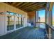 Deck with access to screened porch and wooded views at 3976 Stadler Ne Dr, Conover, NC 28613
