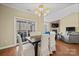 Bright dining area with hardwood floors and access to a deck at 3976 Stadler Ne Dr, Conover, NC 28613