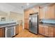 Kitchen features stainless steel appliances and ample wood cabinetry at 3976 Stadler Ne Dr, Conover, NC 28613