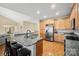 Kitchen boasts granite countertops, stainless steel appliances, and an island with seating at 3976 Stadler Ne Dr, Conover, NC 28613