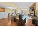 Living area with vaulted ceilings, stone fireplace, and access to deck at 3976 Stadler Ne Dr, Conover, NC 28613